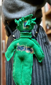 Character made from a recycled pullover and a silk scarf