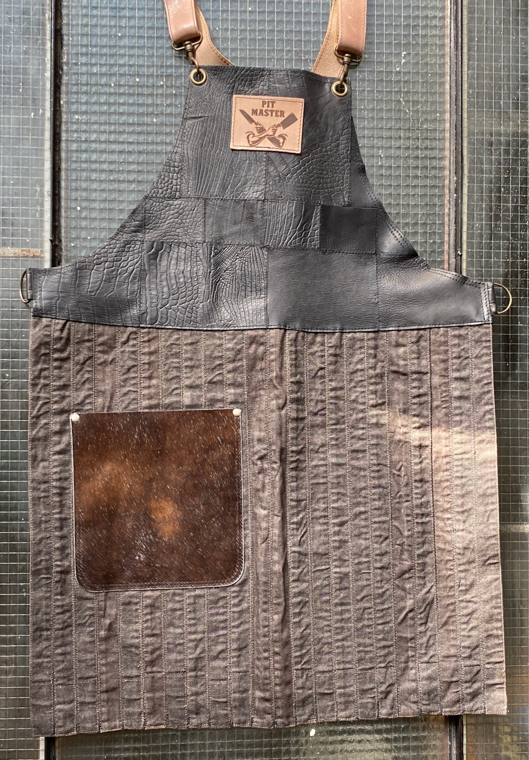 Upcycled leather, cowhide and twill fabric, fully recycled handmade apron.